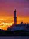 Romantic old Laterna Light in Genoa Italy (of course! "El sole mio!")