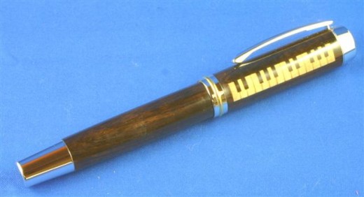 Piano:  This pen is made from African Blackwood with inlaid keys cut with a laser. The keys are made from holly.