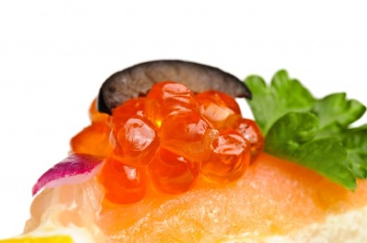 canape with caviar, smoked salmon & veggies from Dreamstime.com
