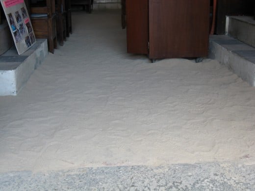 Footprints and drifts in the sand-covered sanctuary on St. Thomas.