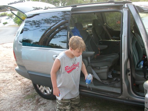 Youngest son getting a drink.