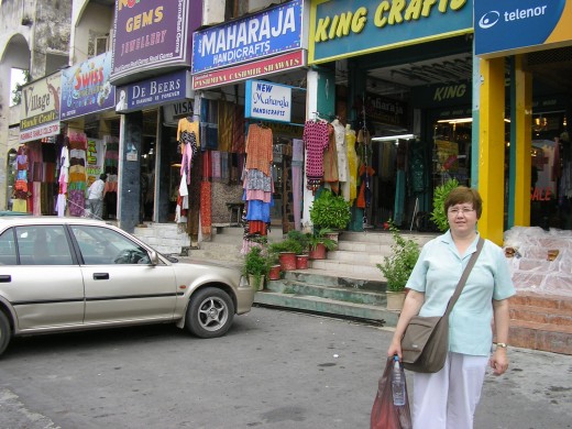 Outside the shop where I bought a water Pashmina shawl.  After being told I should have worn a shawl in the Faisal Mosque.