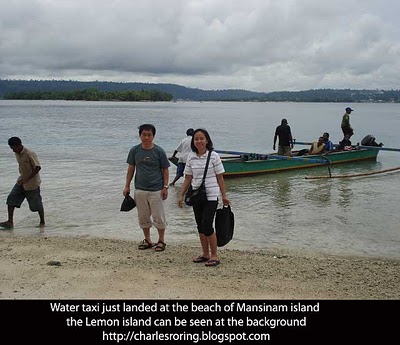 Asian tourists had just landed at the tropical beach of Mansinam island
