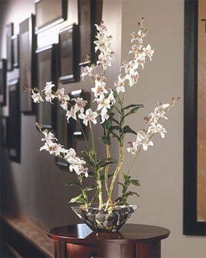 Say it with silk flowers. Who would turn down a beautiful silk orchid. 