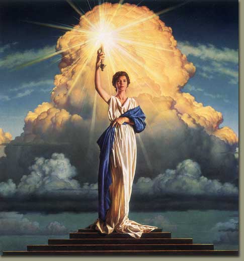The Goddess Columbia, of Columbia motion pictures, standing atop a pyramid.
