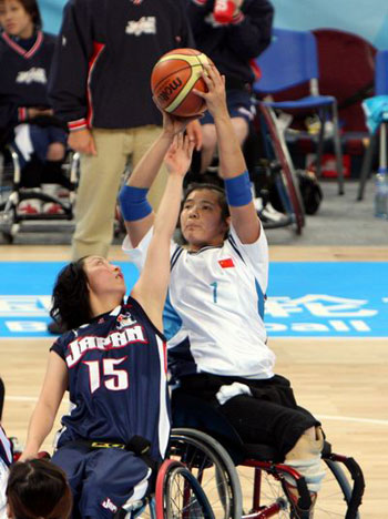 Wheelchair basketball being played at the Beijing Olypmics. From http://images.beijing2008.cn/20080120/Img214236010.jpg