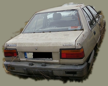 A Mitsubishi Lancer crashes through a bad dream.