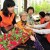 Children give carnation to elderly people korean.net