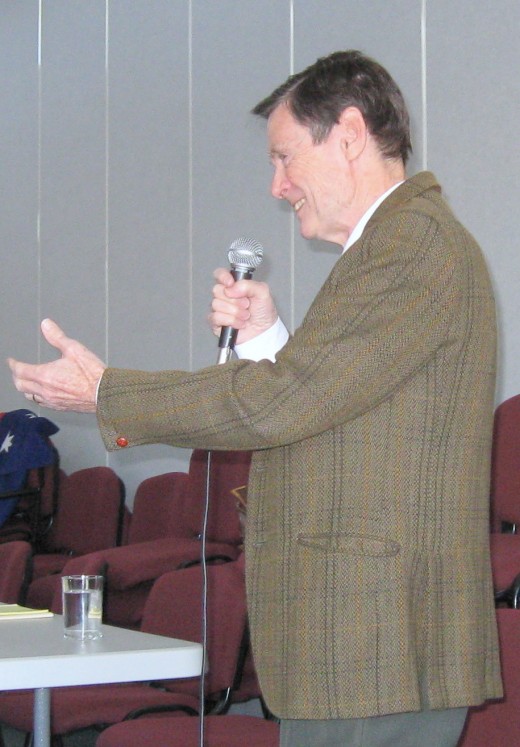 The writer at 74 enjoying himself as he tells a story to the some of the audience you can see in the picture below