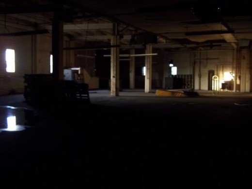 A soon-to-be demolished warehouse converted into an airsoft field. 