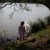 Sun glinting off the quiet water while my daughter Caitlin explores Sun glinting off the quiet water while my daughter Caitlin explores