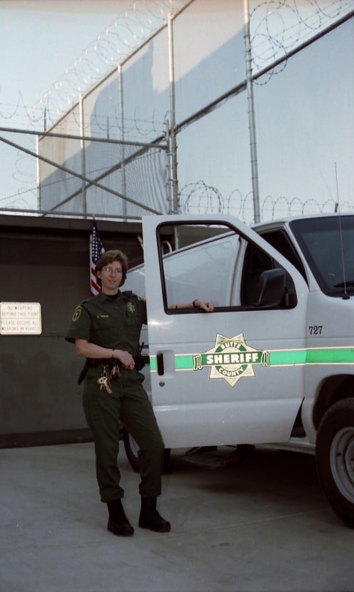 Deb hard at work for the Sheriff's department transportation unit.    copyright 2005