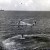 The attempted recovery of Liberty Bell 7. The carrier USS Randolph is seen in the distance. Photo courtesy of NASA.