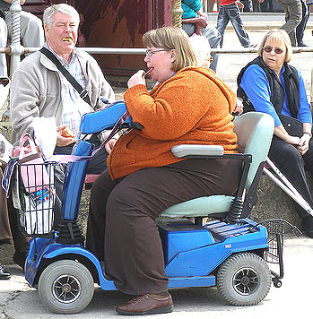 This scooter needs an additional team of four shire horses (out of shot) to pull the lady along