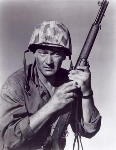 General John Wayne with his foot on Adolf Hitler's throat (out of shot)