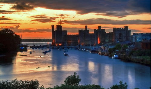 Lovely sunset picture of Caernarfon Castle in Wales.  