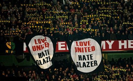 Green and gold anti glazer protests at Man United games.  