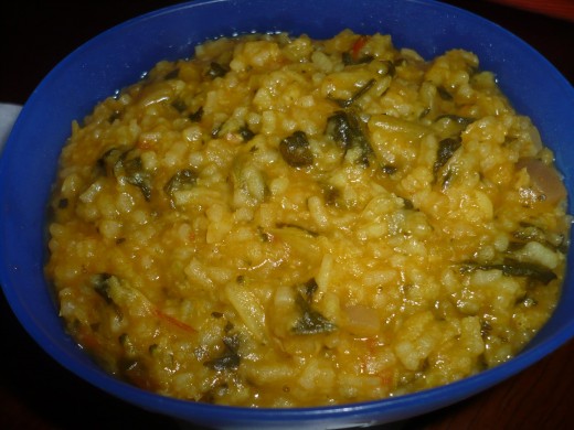 Mung dhuli dal hodgepodge (Hindi name khichdi) with spinach and mustand greens. Also turmeric and astefotida is added for small babies.