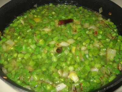 Add all the spices and chopped French beans