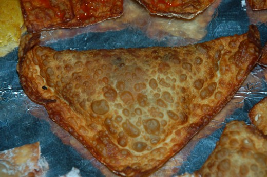  Have too much meat mixture left over? Start making full sized Empanadas! Use a full egg roll shell!