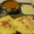 Idlies served with coconut chutney and sambar