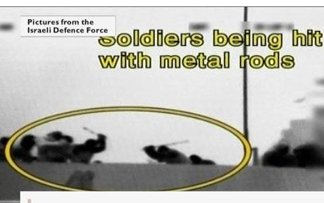 Photo of "activists" resisting Israeli commandos with clubs and possibly knives