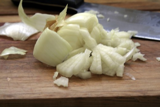 Step 5. Turn the onion sideways and cut through to the end for diced onions.