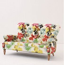 The crisp floral linen on this sofa definitely makes it more current, especially with the clean lines (no skirt).