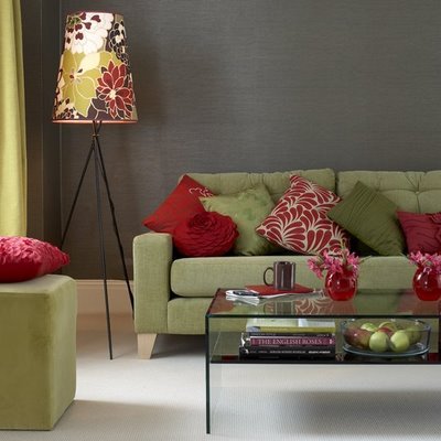 The bold print on the lampshade ties it into the rest of this room's décor by repeating its colors.