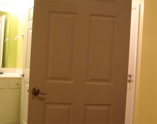 Bedroom door and the bathroom door that collided when both were open.