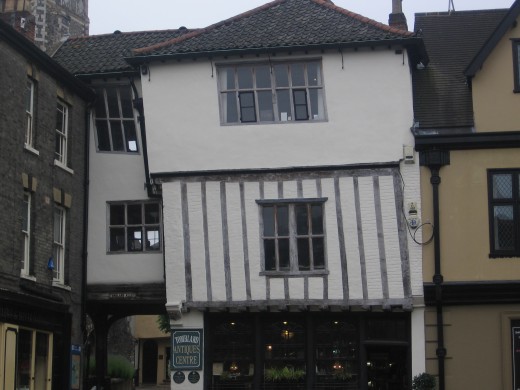 Old, leaning house at Tombland, opposite the Cathedral entrance - now an antique shop
