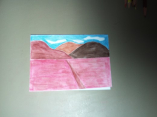 Card with a mountain landscape.