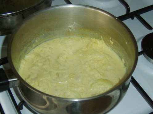 The Rice and Onion should be added to the Milk