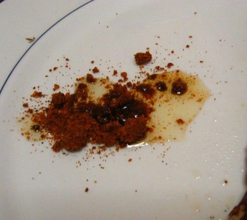 Some Ghee, and chili powder on a plate