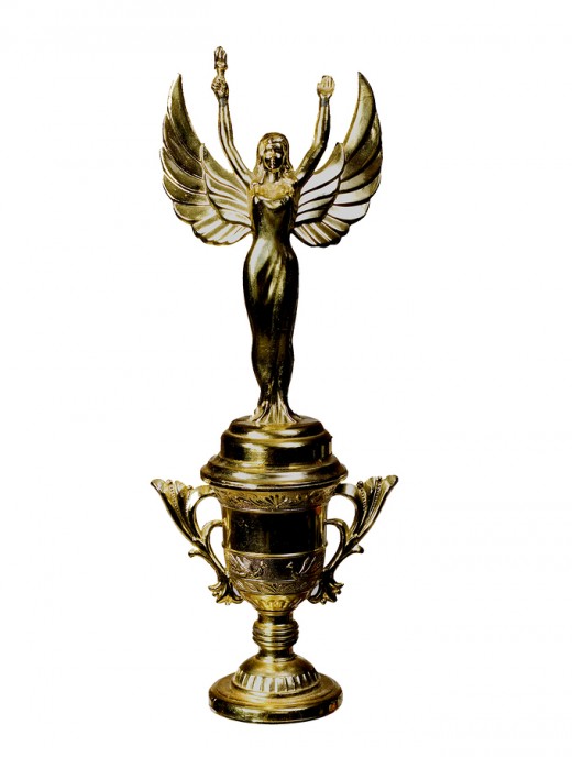 The final winner will have his name imprinted on this trophy (provided my program is working and I can figure out how) and the prize will be delivered by email, in a quiet and subdued, dignified (as befits) virtual ceremony.