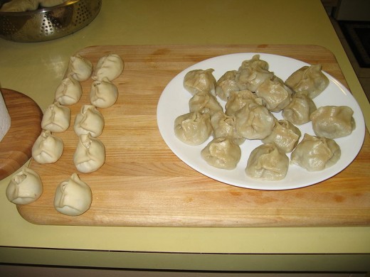 buuz, dumplings -- steamed and with ingredients usually salted with garlic image courtesy of wikipedia