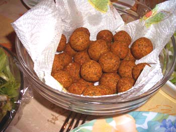 Falafel -- patty which is fried garbanzos, round shaped