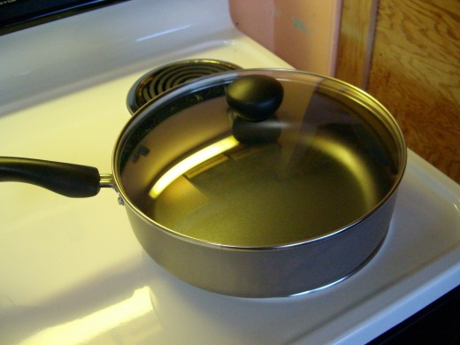 Use a large skillet with a Lid