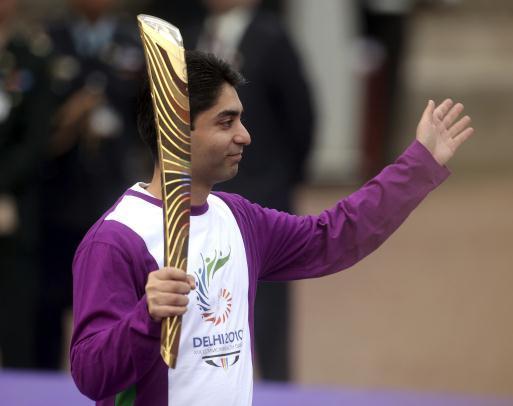 The gold medalist shooter Abhinav Bindra is the first baton bearer