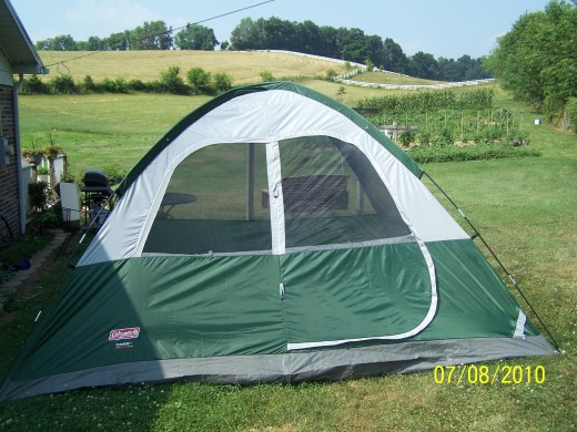 The front of the tent. Notice the mesh windows and at the bottom the electrical access port. This is without the rain guard installed.