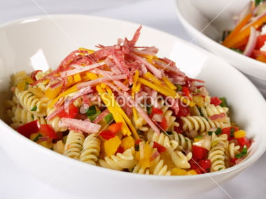 Precooked and chilled pasta can serve as a great base for a salad or mixed in with other ingredients.