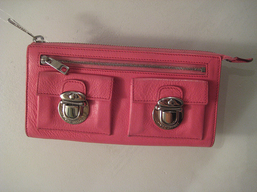 A Wallet, Such As What Might Be Carried By A Lady A Wallet, Such As What Might Be Carried By A Lady