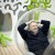 Eero Aarnio In His Famous Hanging Bubble Chair