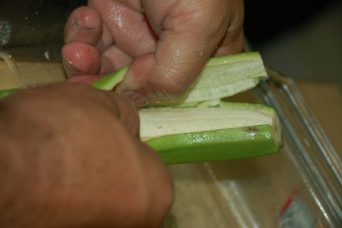  The easy way to shuck a plantain, run a knife from end to end after removing both tips!