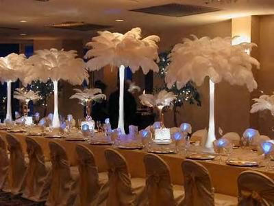 Eiffel tower vases using white ostrich feathers and floralytes