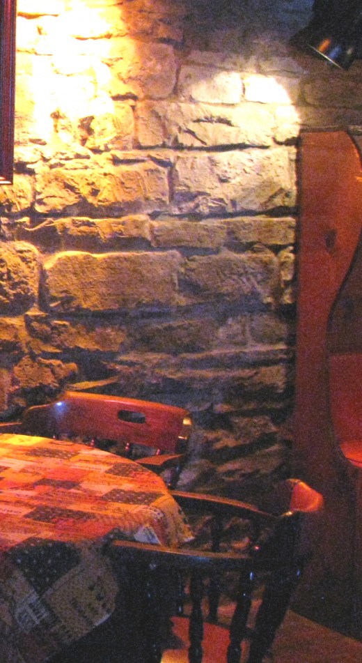 The enlargement of the area in this photo shows it more clearly.  Could this have been the Lady in Blue dropping by?