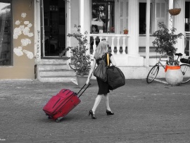 woman pulling bagcase  
