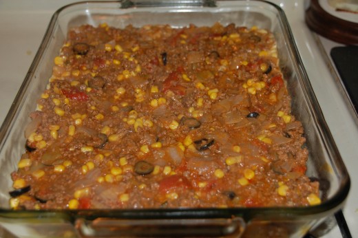  In the casserole dish ready for cornbread layer.