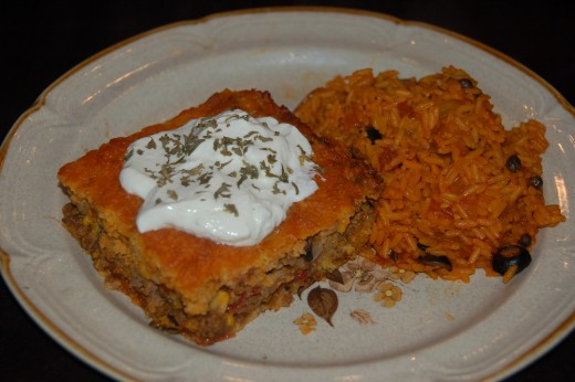  The Cornbread casserole topped with Greek yogurt and a little cilantro. It sides well with Spanish rice!