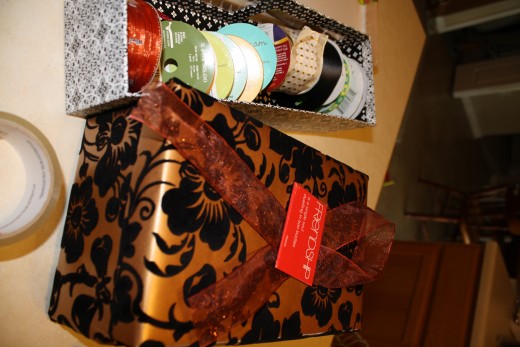Step ten: Accessorize! Find ribbon and such to complement the colors of your box.